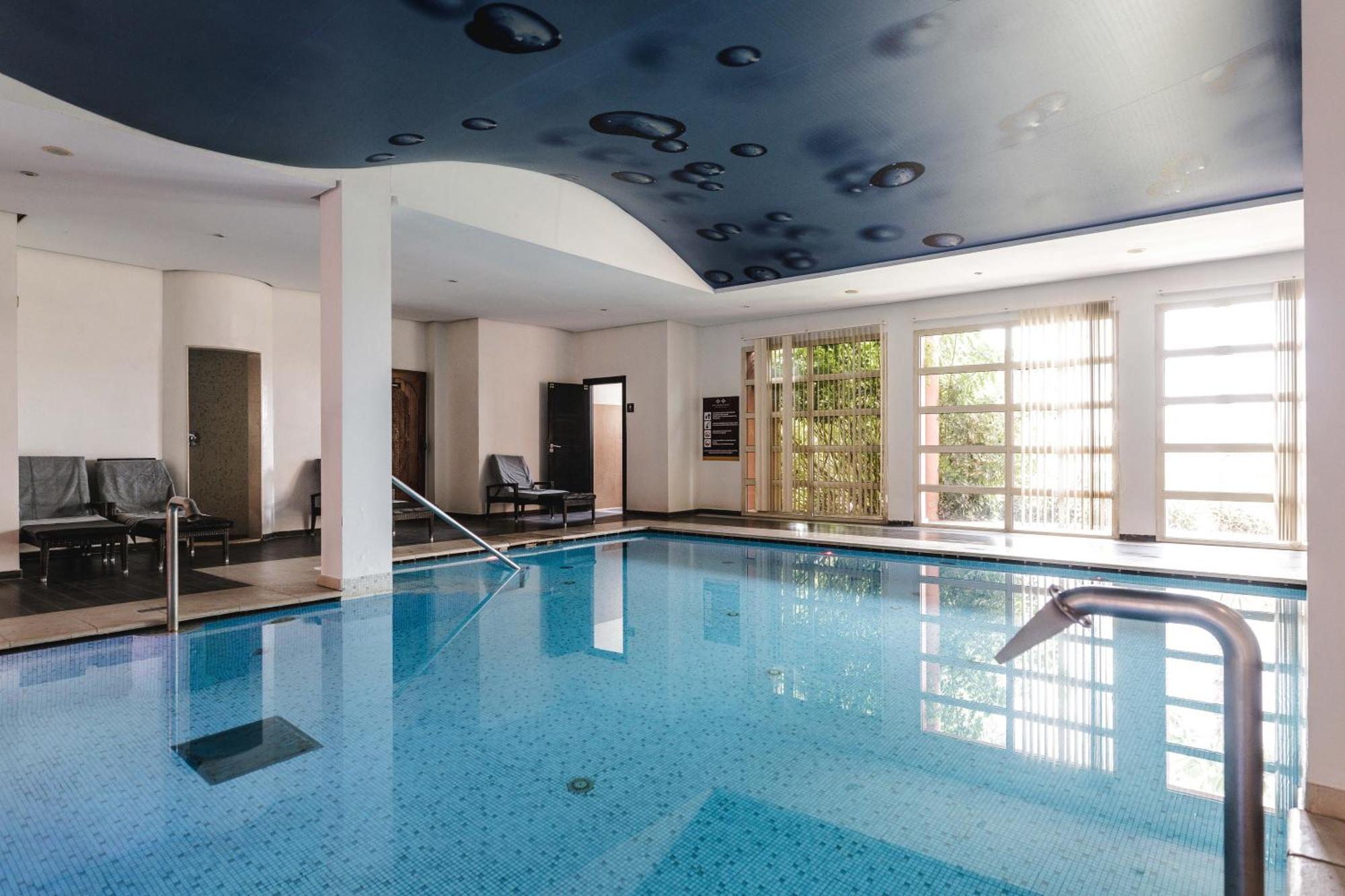 فندق قصر كنزي المنارة - مراكش المظهر الخارجي الصورة The swimming pool at the hotel