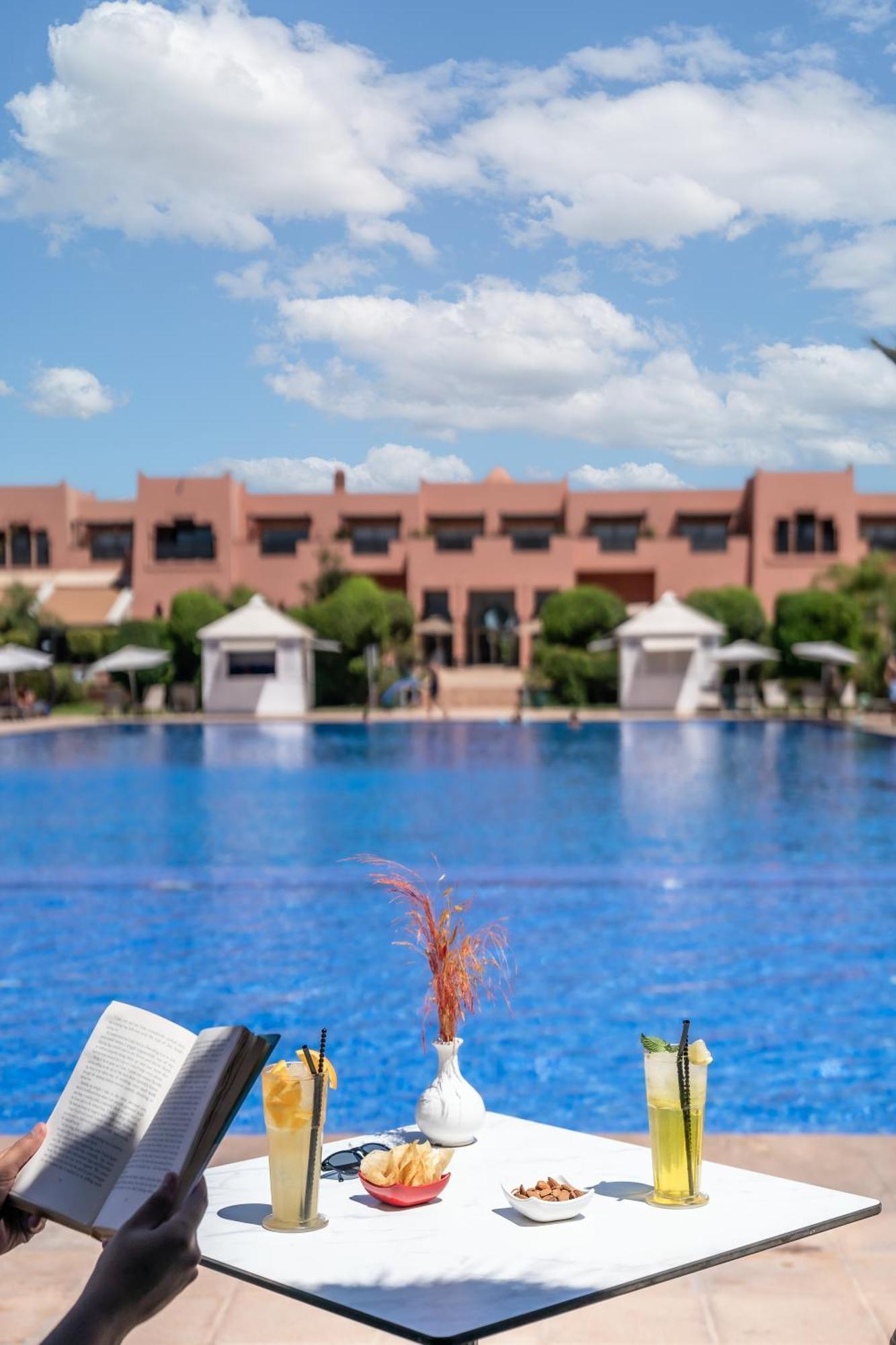 فندق قصر كنزي المنارة - مراكش المظهر الخارجي الصورة The swimming pool at the hotel